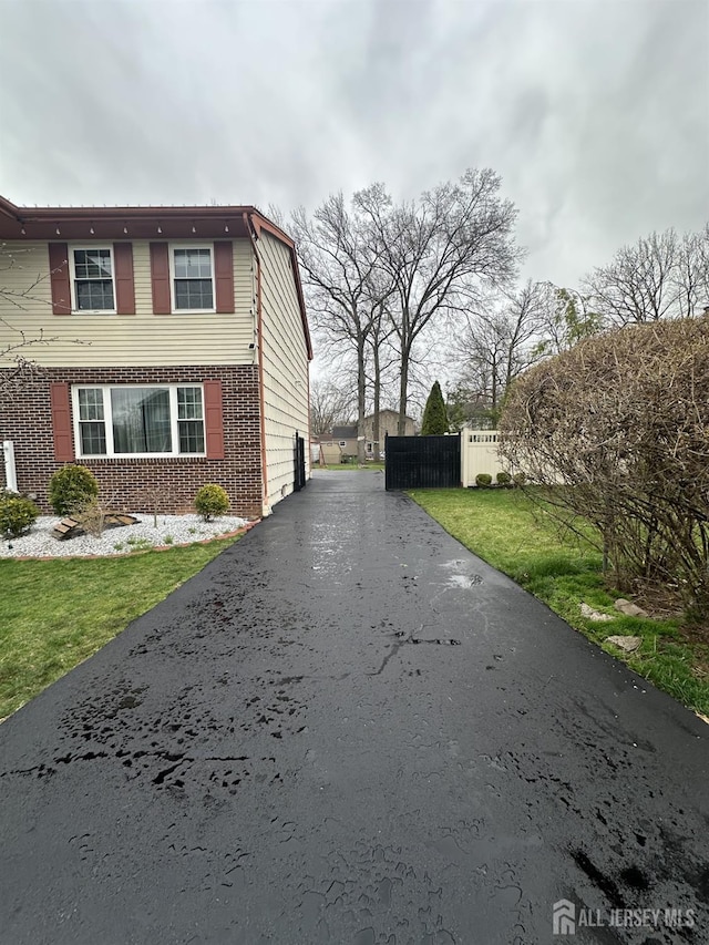 741 S Middlesex Ave S, Colonia, NJ 07067 - view of home's exterior featuring driveway and brick siding