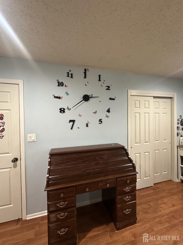741 S Middlesex Ave S, Colonia, NJ 07067 - unfurnished office with light wood finished floors and a textured ceiling
