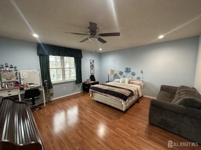 741 S Middlesex Ave S, Colonia, NJ 07067 - bedroom with a desk, wood finished floors, baseboards, recessed lighting, and a textured ceiling