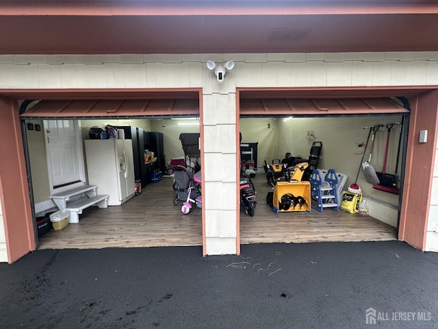 741 S Middlesex Ave S, Colonia, NJ 07067 - garage featuring white refrigerator with ice dispenser