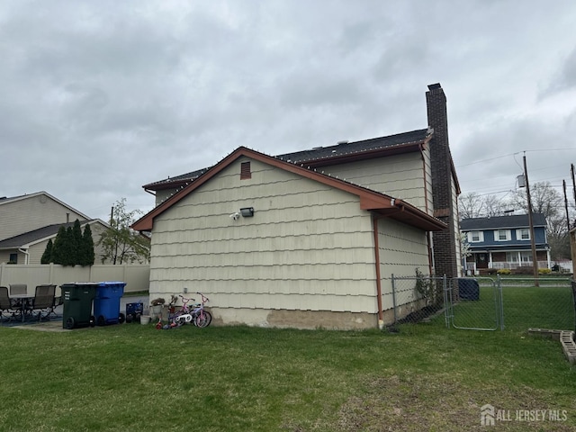 741 S Middlesex Ave S, Colonia, NJ 07067 - view of property exterior featuring a chimney
