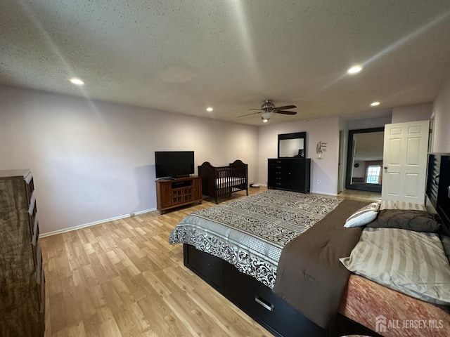 741 S Middlesex Ave S, Colonia, NJ 07067 - bedroom with light wood-type flooring, recessed lighting, baseboards, and a textured ceiling
