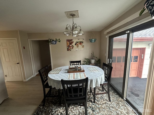 741 S Middlesex Ave S, Colonia, NJ 07067 - dining area with plenty of natural light, a chandelier, wood finished floors, and baseboards
