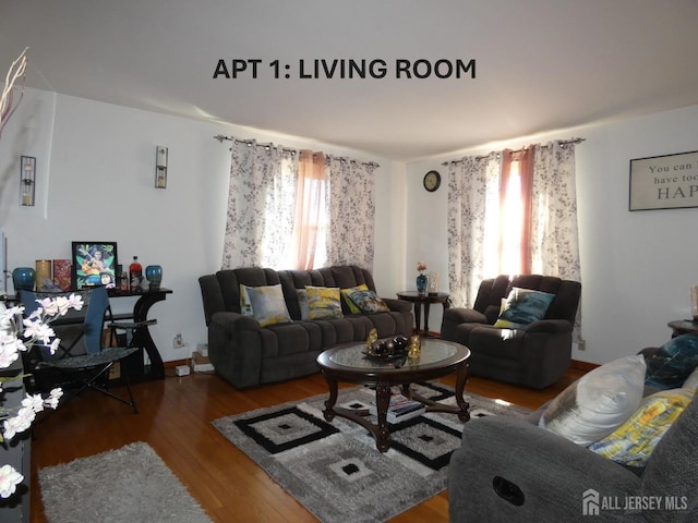123 Heald St, Carteret, NJ 07008 - living area with healthy amount of natural light and wood finished floors