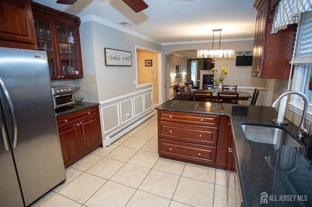 1 Stradford Rd, Sayreville, NJ 08859 - kitchen with freestanding refrigerator, a baseboard heating unit, a ceiling fan, ornamental molding, and light tile patterned floors