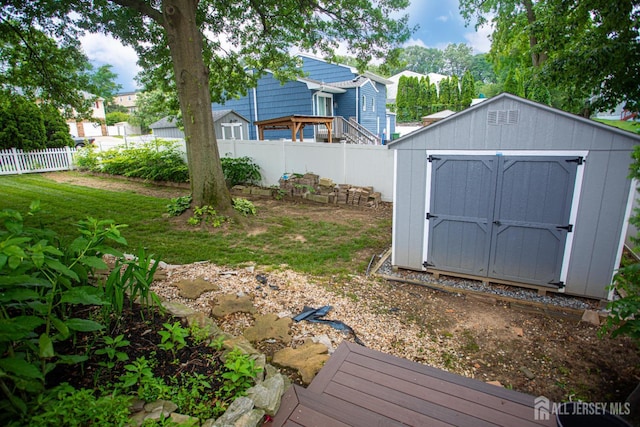 1 Stradford Rd, Sayreville, NJ 08859 - fenced backyard featuring a shed