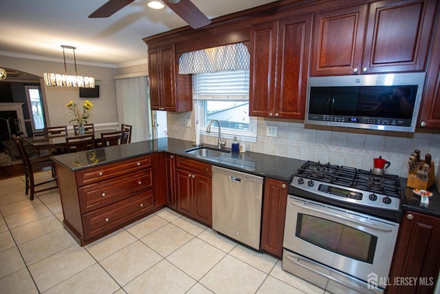 1 Stradford Rd, Sayreville, NJ 08859 - kitchen with stainless steel appliances, ceiling fan, ornamental molding, backsplash, and a peninsula