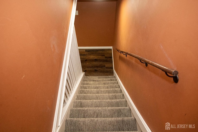 1 Stradford Rd, Sayreville, NJ 08859 - stairway featuring carpet floors and baseboards