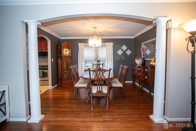 1 Stradford Rd, Sayreville, NJ 08859 - dining room featuring arched walkways, wood finished floors, a chandelier, and crown molding