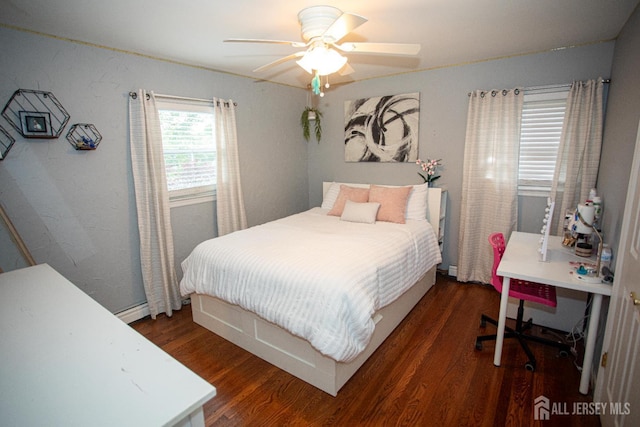 1 Stradford Rd, Sayreville, NJ 08859 - bedroom with wood finished floors, baseboard heating, and a ceiling fan