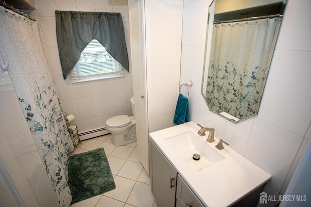 1 Stradford Rd, Sayreville, NJ 08859 - bathroom featuring baseboard heating, tile walls, vanity, and tile patterned flooring