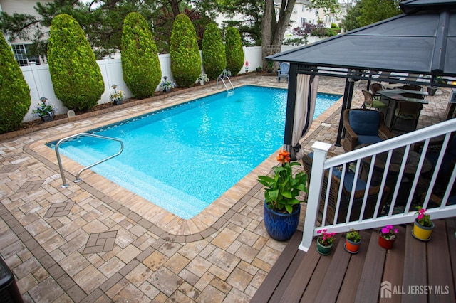 1 Stradford Rd, Sayreville, NJ 08859 - view of swimming pool with a fenced backyard, a patio, and a gazebo