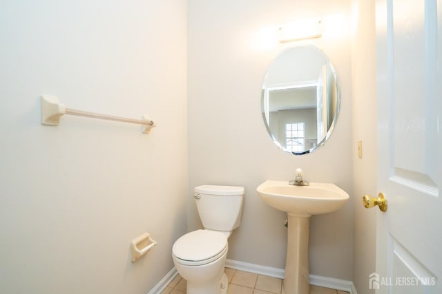 17 Larkspur Dr, South Brunswick, NJ 08810 - bathroom with toilet, tile patterned floors, and baseboards