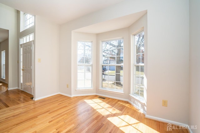 17 Larkspur Dr, South Brunswick, NJ 08810 - entrance foyer featuring visible vents, light wood-type flooring, and baseboards