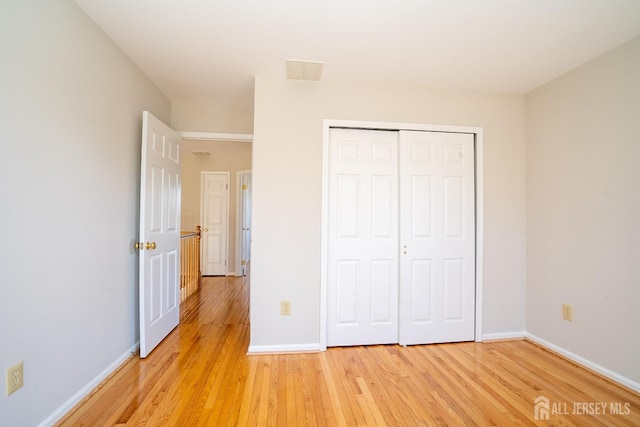 17 Larkspur Dr, South Brunswick, NJ 08810 - unfurnished bedroom with a closet, light wood-type flooring, and baseboards