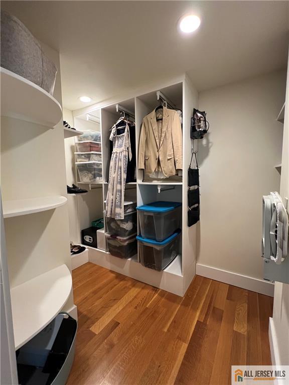 12 S 8th Ave, Highland Park, NJ 08904 - spacious closet featuring wood finished floors