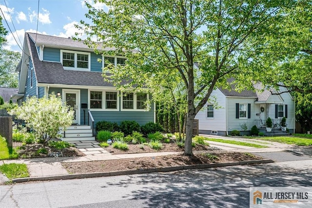 12 S 8th Ave, Highland Park, NJ 08904 - view of front of house with roof with shingles