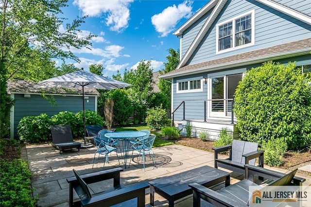 12 S 8th Ave, Highland Park, NJ 08904 - view of patio / terrace with outdoor dining space