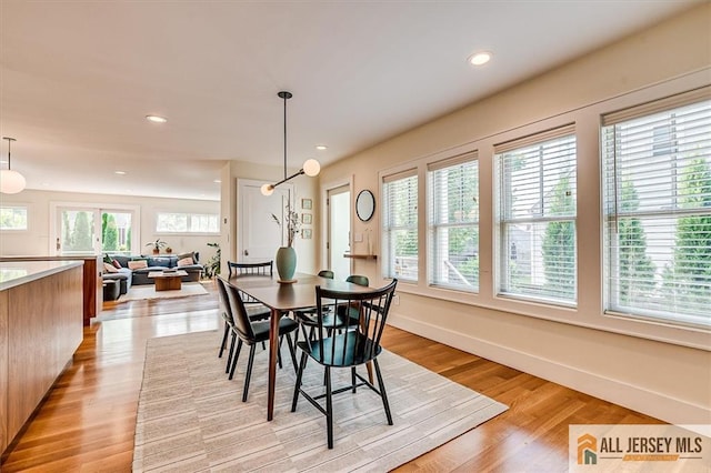 12 S 8th Ave, Highland Park, NJ 08904 - dining room featuring light wood-type flooring, recessed lighting, and baseboards