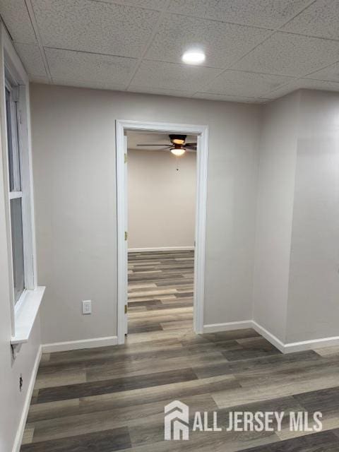 601 Ridgeway Ave, South Amboy, NJ 08879 - corridor featuring wood finished floors, baseboards, and a drop ceiling
