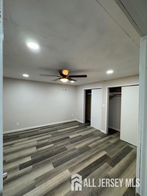 601 Ridgeway Ave, South Amboy, NJ 08879 - unfurnished bedroom featuring two closets, baseboards, dark wood-style floors, recessed lighting, and ceiling fan
