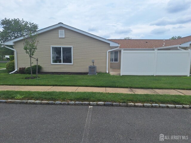 546 Cornus Plz Unit C, Monroe, NJ 08831 - view of side of property featuring a central air condition unit