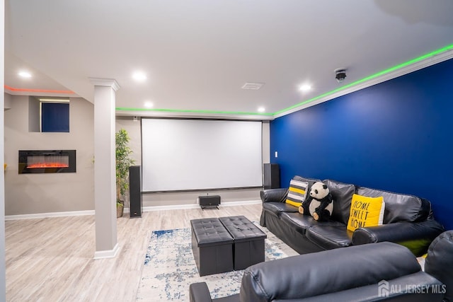 345 Morning Glory Dr, Monroe, NJ 08831 - cinema room with baseboards, a glass covered fireplace, wood finished floors, and recessed lighting