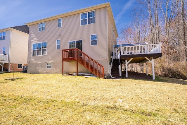 345 Morning Glory Dr, Monroe, NJ 08831 - back of property with stairway, a wooden deck, and a yard