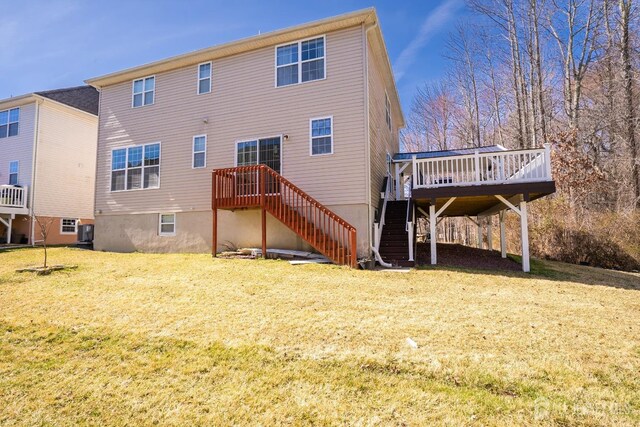 345 Morning Glory Dr, Monroe, NJ 08831 - back of property with stairs, a wooden deck, a yard, and central air condition unit
