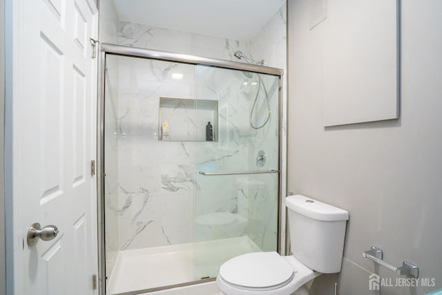 345 Morning Glory Dr, Monroe, NJ 08831 - full bathroom featuring toilet and a marble finish shower