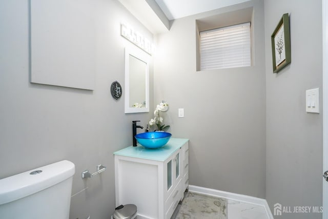 345 Morning Glory Dr, Monroe, NJ 08831 - bathroom featuring marble finish floor, vanity, toilet, and baseboards