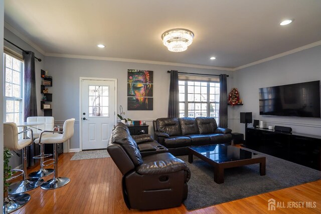 345 Morning Glory Dr, Monroe, NJ 08831 - living room with plenty of natural light, wood-type flooring, ornamental molding, recessed lighting, and baseboards