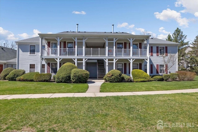 135 Hatfield Ln, East Brunswick, NJ 08816 - view of front of home featuring stairway and a front yard