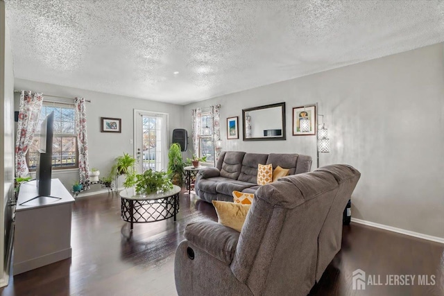 135 Hatfield Ln, East Brunswick, NJ 08816 - living room with baseboards, wood finished floors, and a textured ceiling
