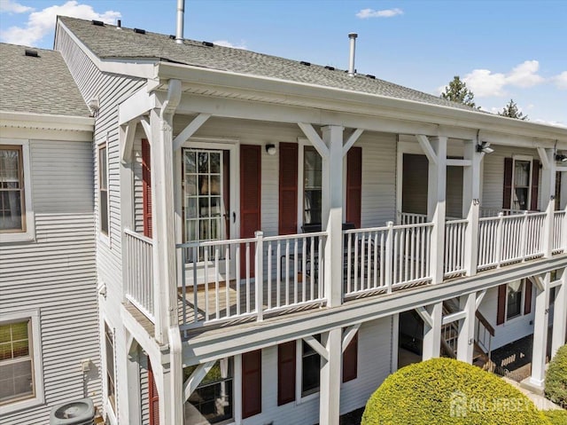 135 Hatfield Ln, East Brunswick, NJ 08816 - view of side of property with a shingled roof and a central air condition unit