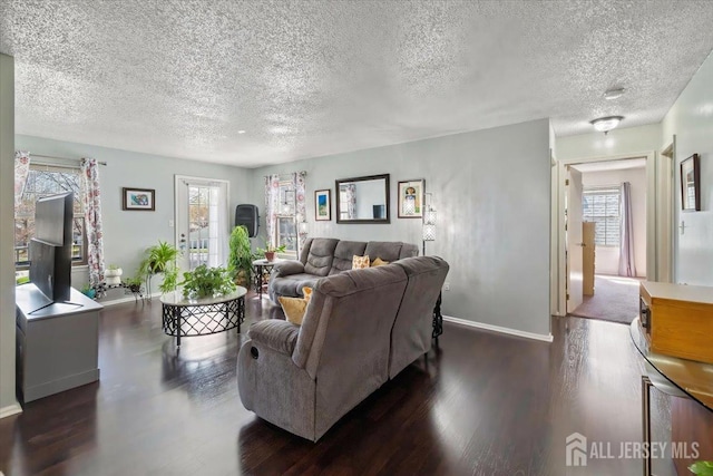 135 Hatfield Ln, East Brunswick, NJ 08816 - living room with baseboards, a textured ceiling, and dark wood finished floors