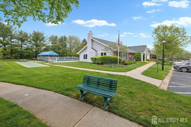 135 Hatfield Ln, East Brunswick, NJ 08816 - view of home's community with fence and a lawn