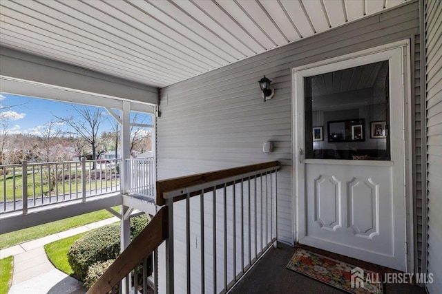 135 Hatfield Ln, East Brunswick, NJ 08816 - view of exterior entry featuring fence