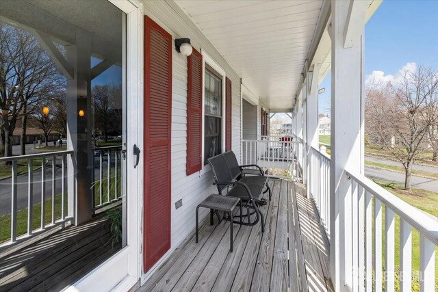 135 Hatfield Ln, East Brunswick, NJ 08816 - wooden deck with a porch