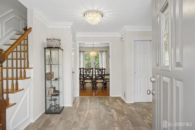 4 Franklin Ct, East Brunswick, NJ 08816 - entryway featuring a chandelier, stairway, crown molding, and baseboards