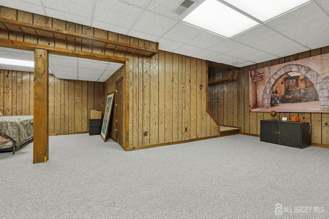 4 Franklin Ct, East Brunswick, NJ 08816 - finished below grade area featuring a paneled ceiling, carpet flooring, baseboards, and wooden walls