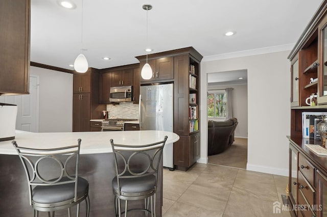4 Franklin Ct, East Brunswick, NJ 08816 - kitchen with appliances with stainless steel finishes, ornamental molding, open shelves, a peninsula, and decorative light fixtures