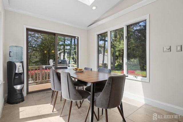 4 Franklin Ct, East Brunswick, NJ 08816 - dining room with vaulted ceiling, baseboards, light tile patterned floors, a skylight, and recessed lighting