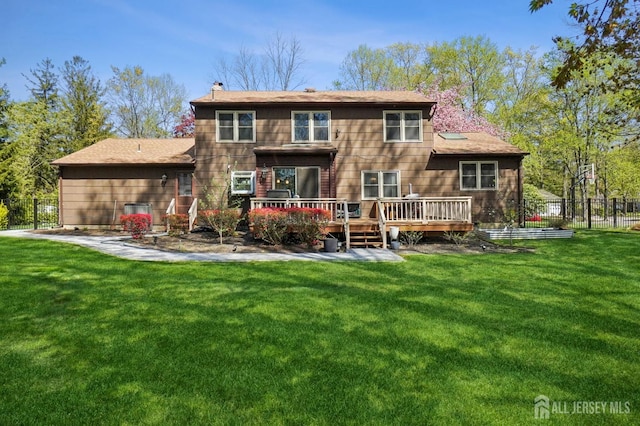 4 Franklin Ct, East Brunswick, NJ 08816 - back of house with a wooden deck and a chimney