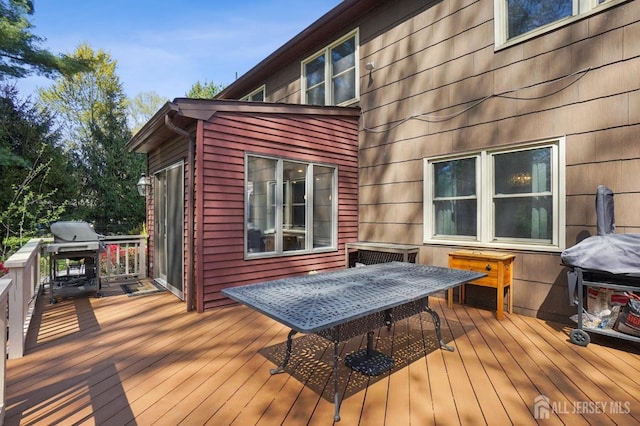 4 Franklin Ct, East Brunswick, NJ 08816 - wooden terrace featuring area for grilling and outdoor dining area