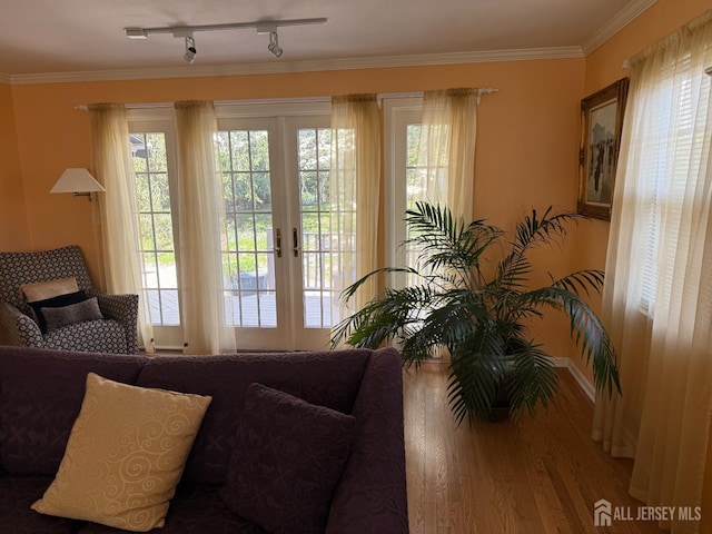17 SE Candle Ln, East Brunswick, NJ 08816 - doorway to outside featuring track lighting, ornamental molding, french doors, and wood finished floors