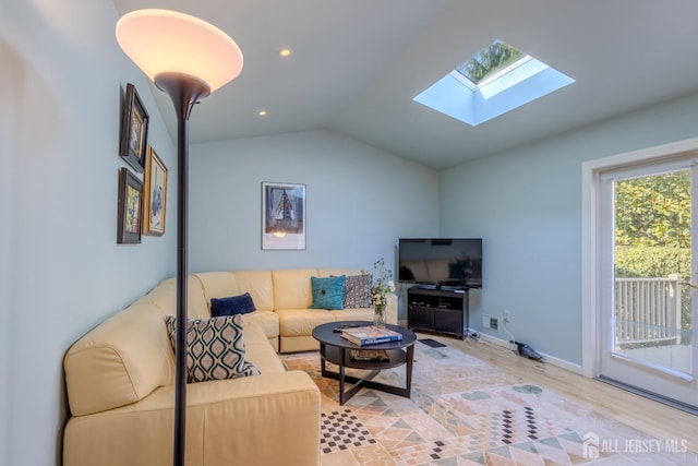 17 SE Candle Ln, East Brunswick, NJ 08816 - living area featuring recessed lighting, baseboards, light wood finished floors, and lofted ceiling with skylight