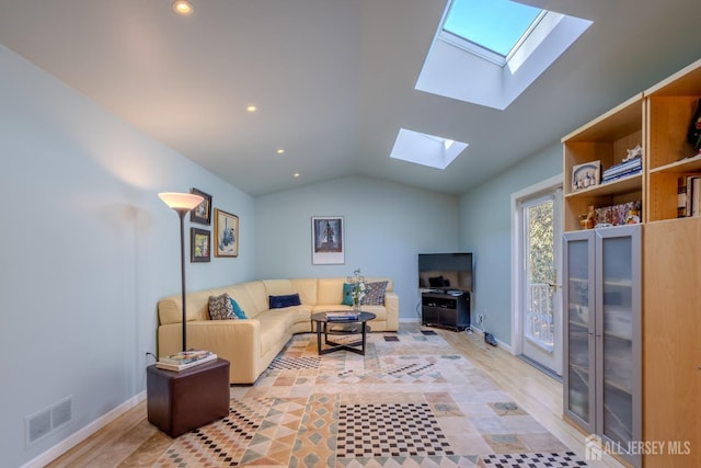 17 SE Candle Ln, East Brunswick, NJ 08816 - living room with recessed lighting, baseboards, lofted ceiling with skylight, and visible vents