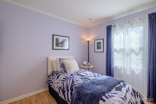 17 SE Candle Ln, East Brunswick, NJ 08816 - bedroom with crown molding, baseboards, and light wood-style flooring