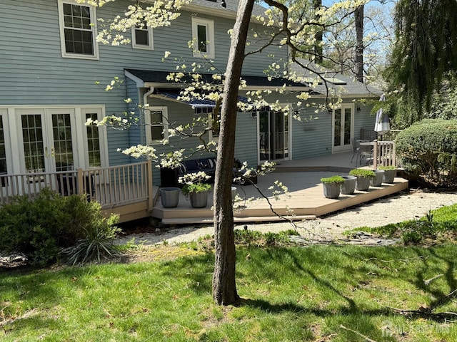 17 SE Candle Ln, East Brunswick, NJ 08816 - rear view of property with french doors, a yard, and a deck